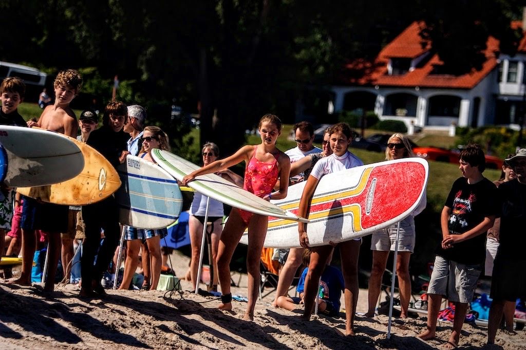 A handmade Dairyland Surf float and participants in a Sheboygan parade.