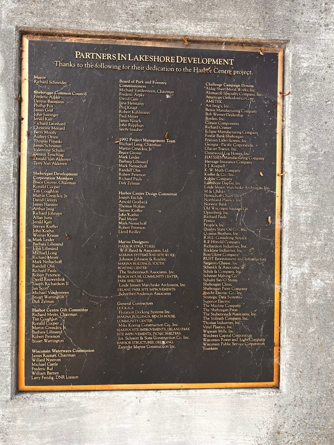 A public memorial plaque photographed in Sheboygan.